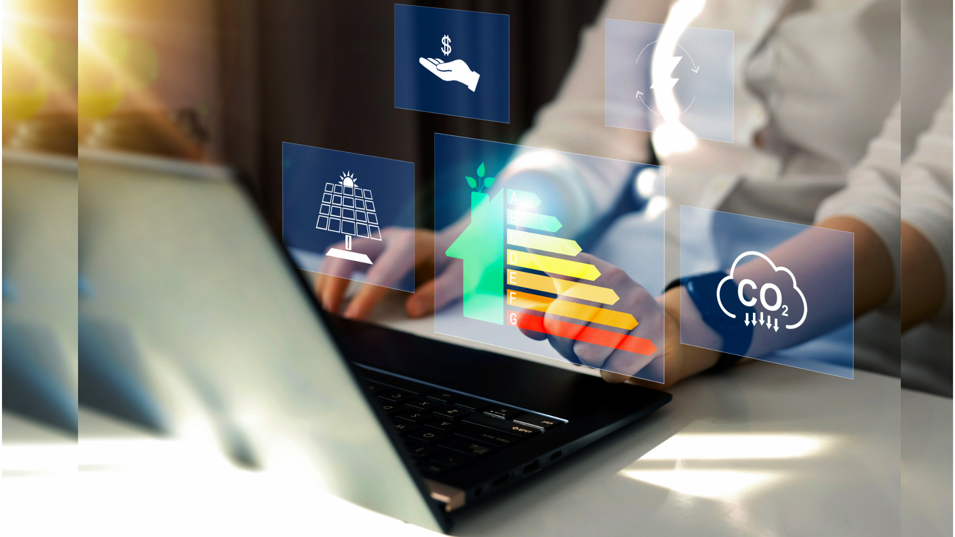 A person's hands are shown using a laptop to conduct a retrofit feasibility study, interacting with holographic data displays that represent energy efficiency, solar power, cost savings and reduced carbon emissions.