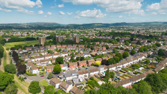 Aerial view of a residential neighbourhood in Cardiff, showing a mix of terraced houses, gardens and tower blocks