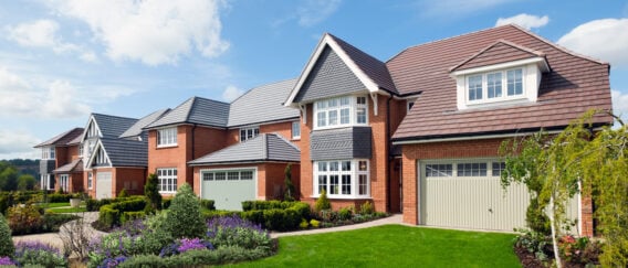 Redrow new-build homes at Churchlands, Cardiff, with traditional brick and tile facades assessed for Part O overheating compliance