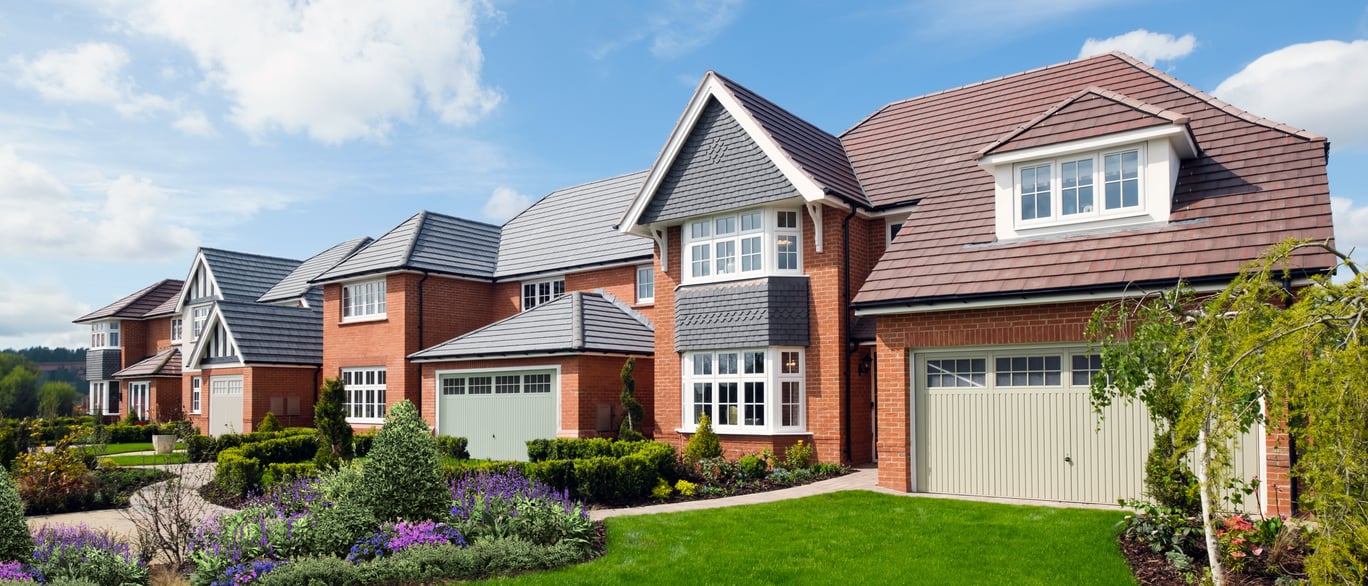 Redrow new-build homes at Churchlands, Cardiff, with traditional brick and tile facades assessed for Part O overheating compliance